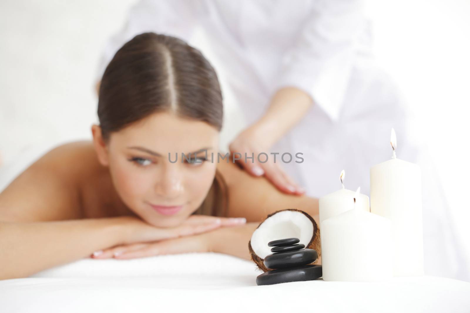 Woman getting spa massage by ALotOfPeople