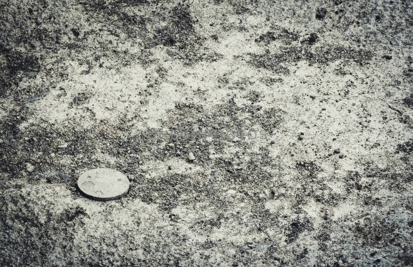 old coin on ground by ahimaone