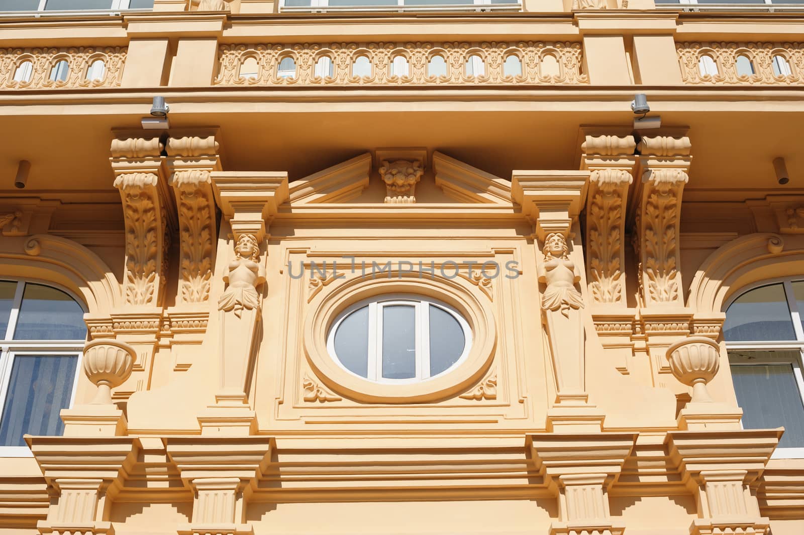 architecture of the historic building with Windows and arches.