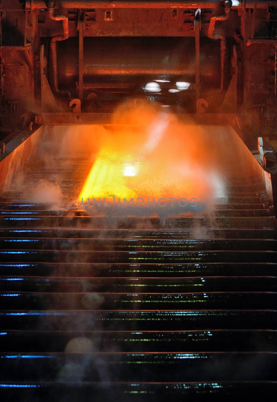Hot steel on conveyor in steel plant