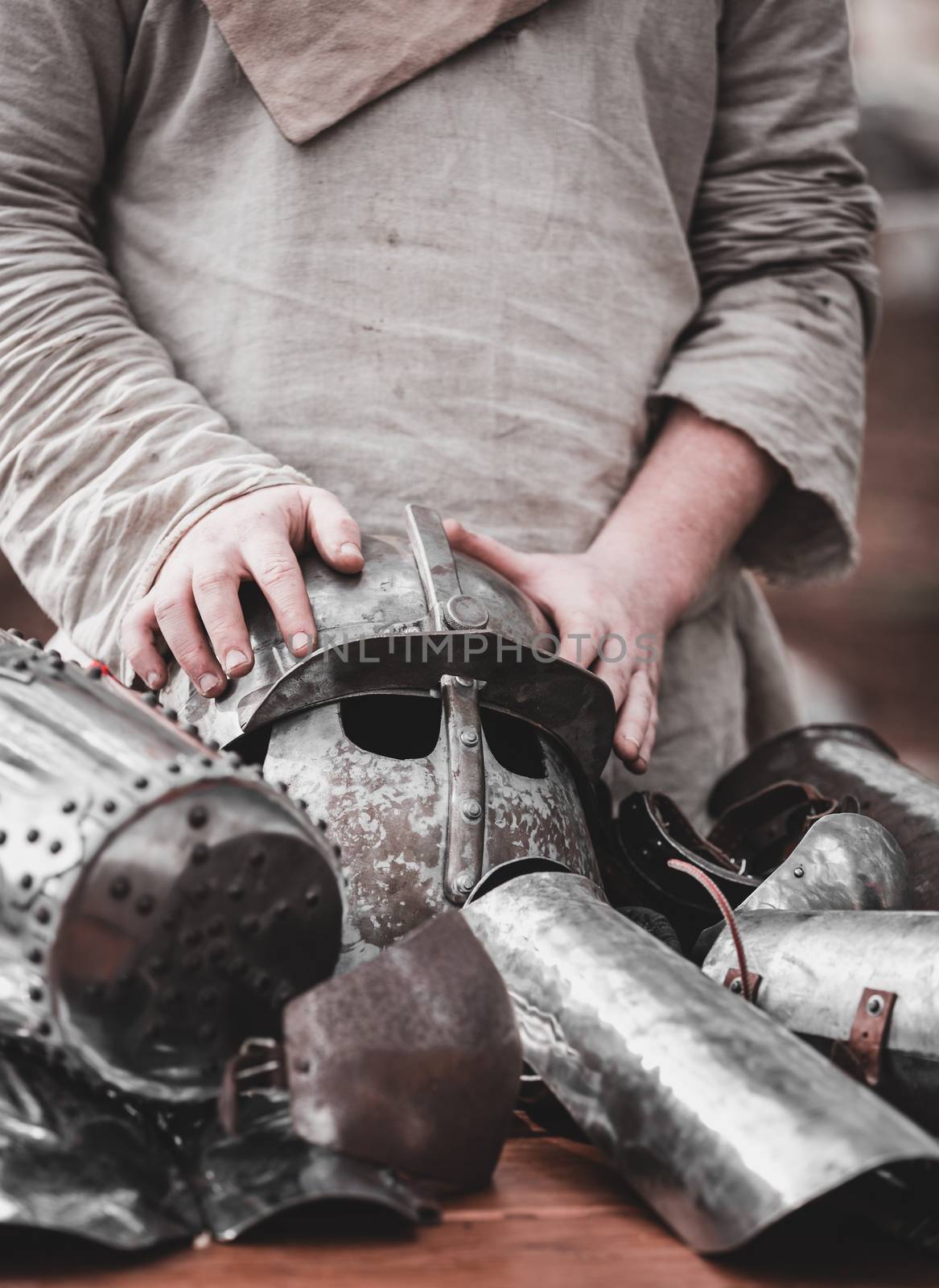 medieval knight armor and man's hand close-up