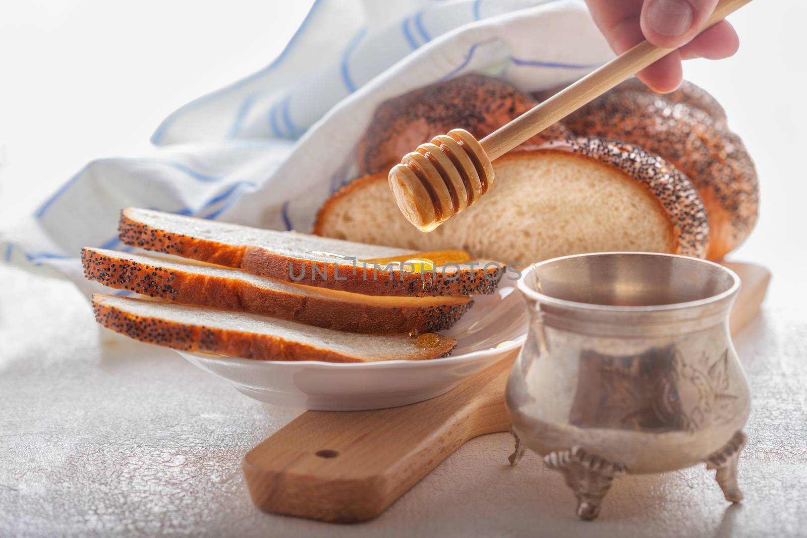 Braided Challah bread and honey  by supercat67