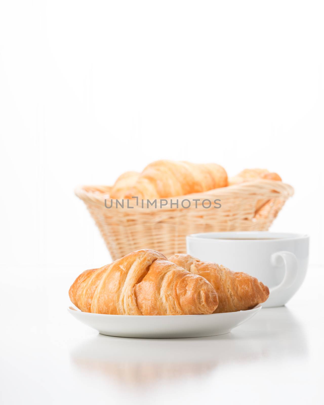 Fresh and delicate croissants served with coffee.
