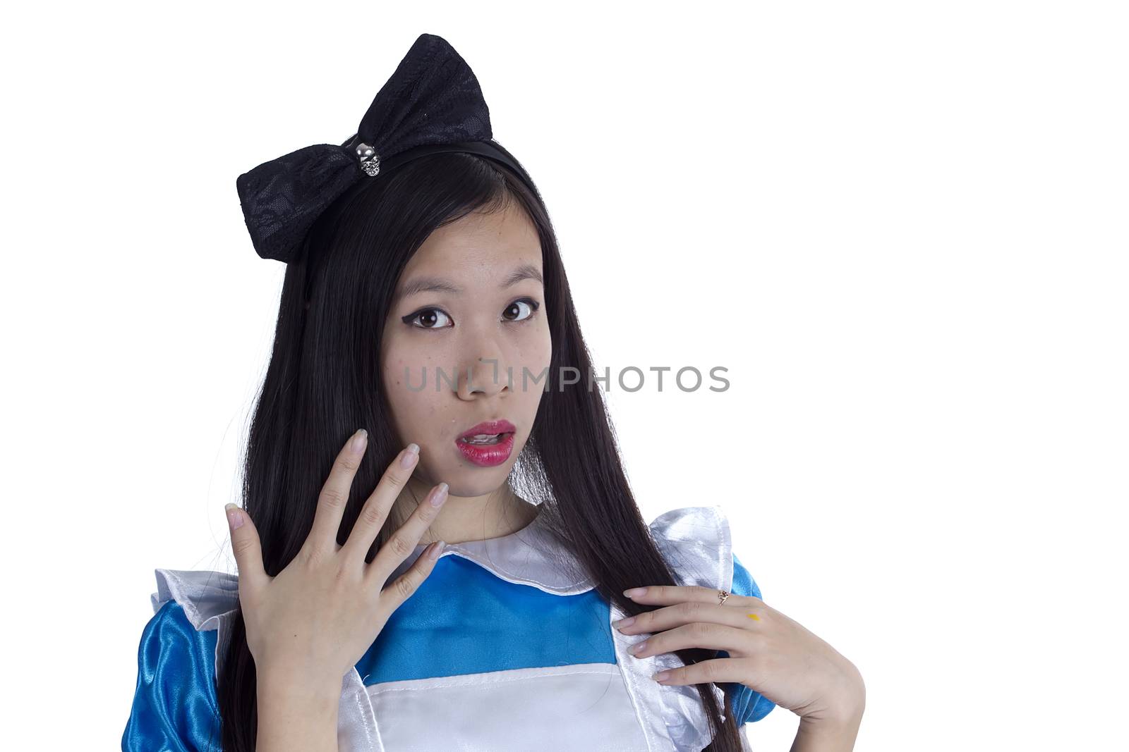 Young girl in the image of Alice on a white background