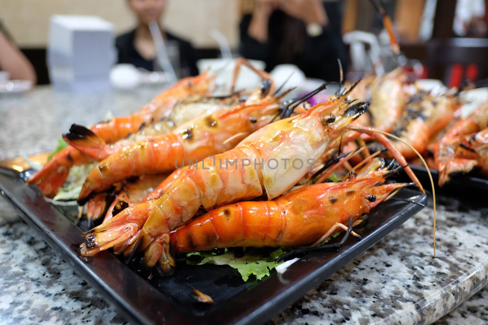 Burn shrim seafood on table 