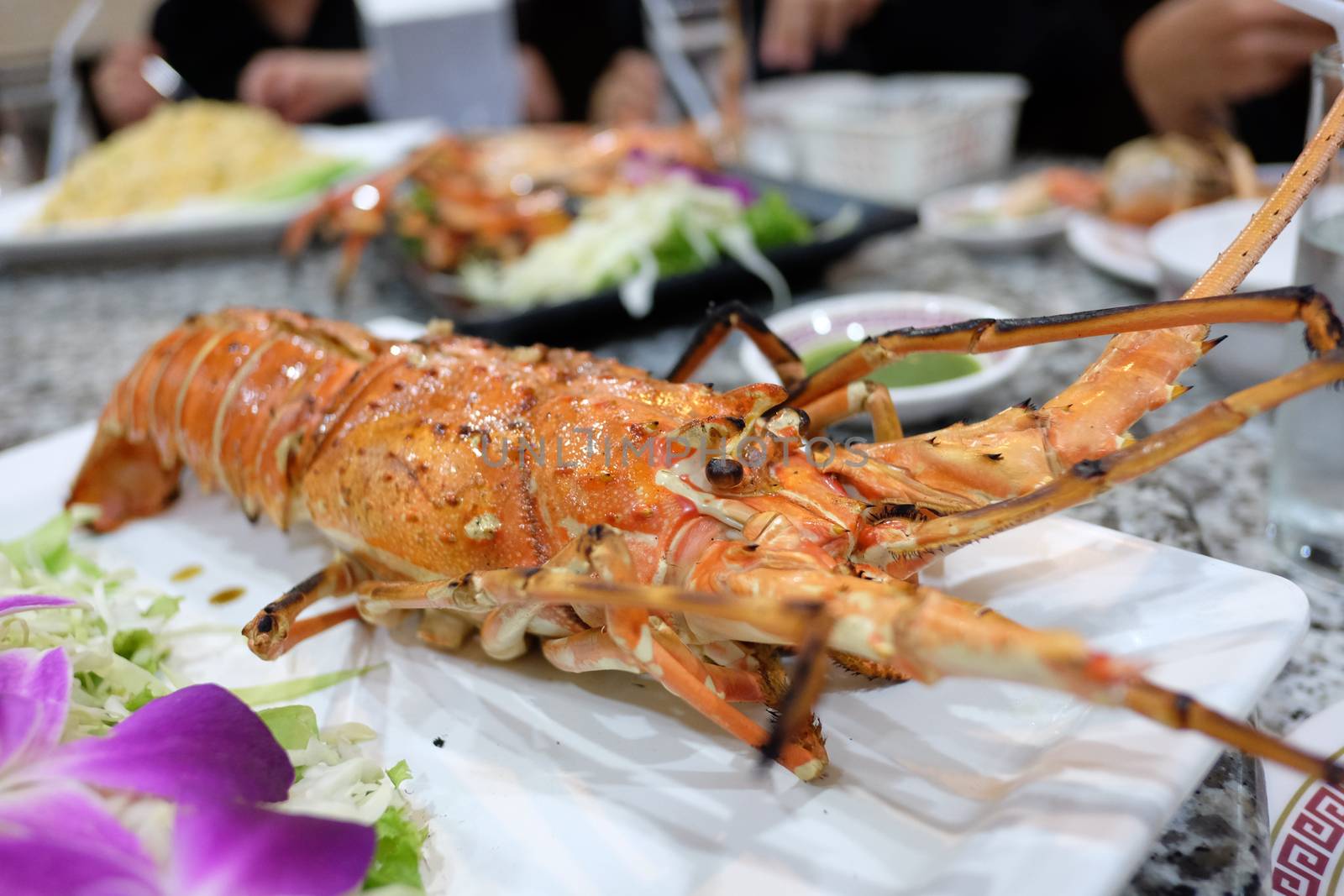 lobster with garilc on table