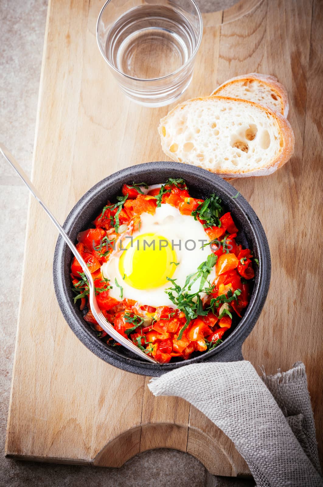 Traditional middle eastern dish of shakshuka in a pan. by supercat67