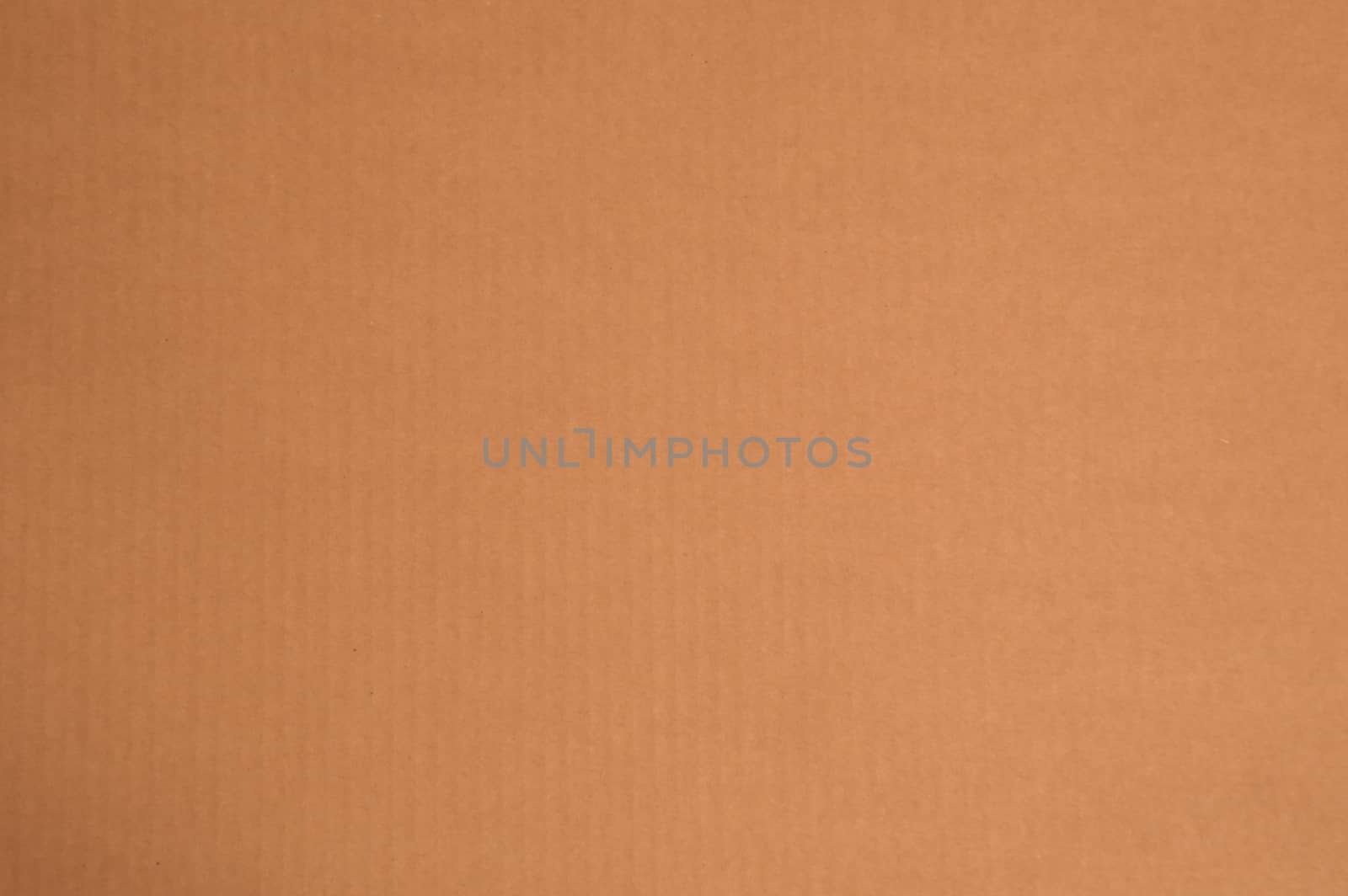 Simple background of plain kraft paper or cardboard with subtle vertical stripes