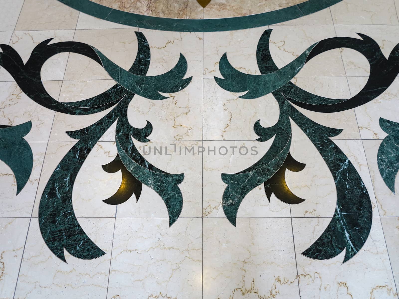 A pattern, design, on a tile floor