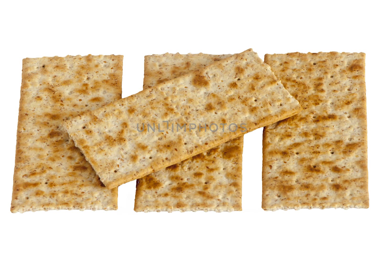 some whole wheat crackers on white background