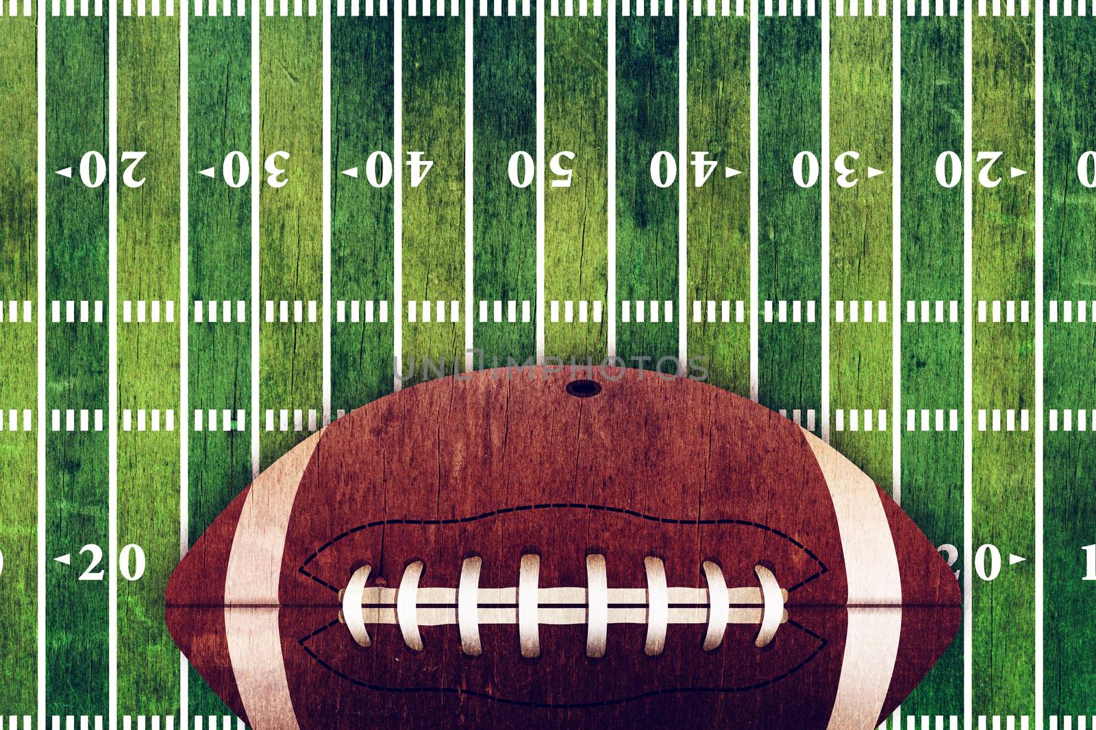 A retro grunge American football field and ball background illustration.