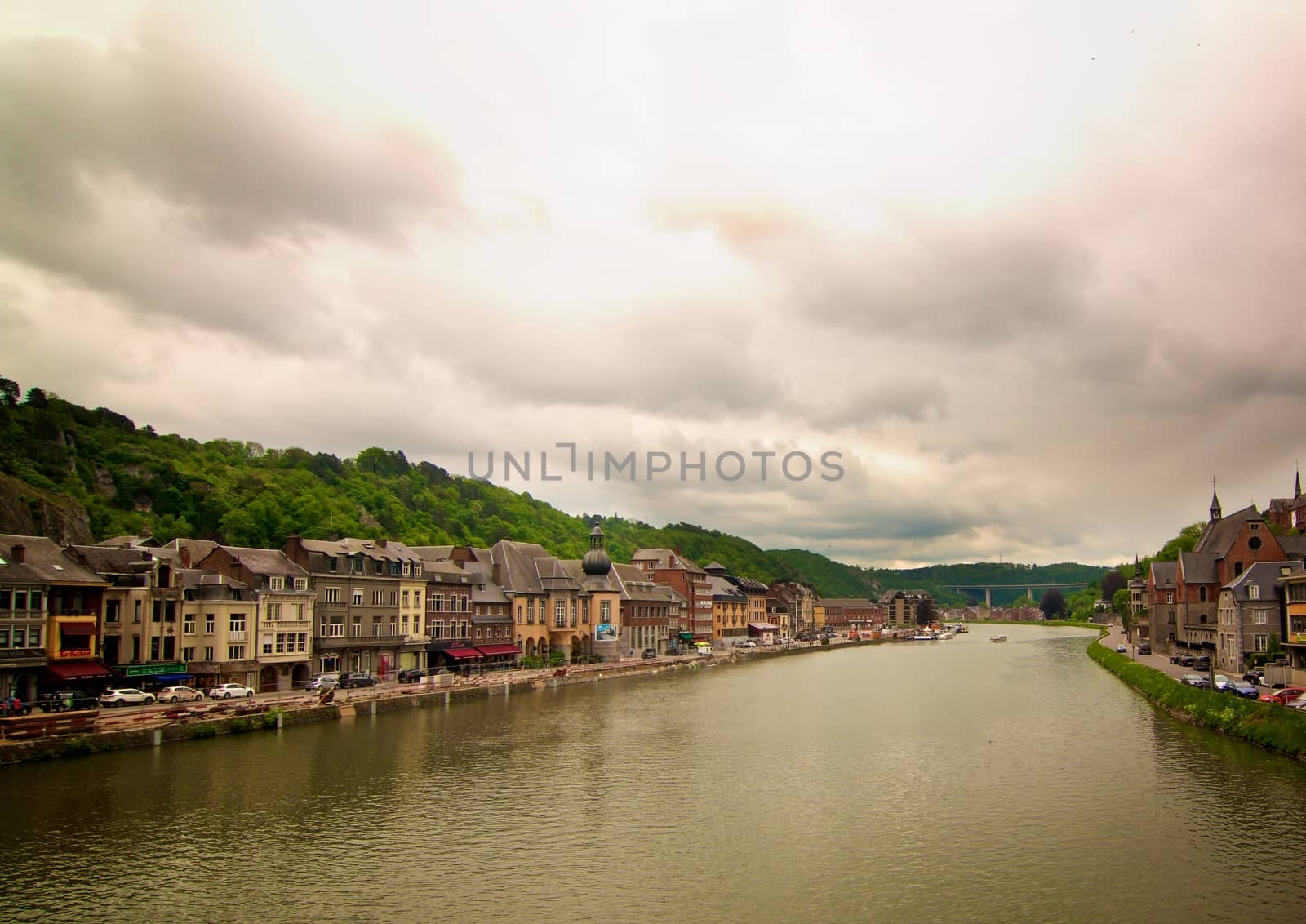 Landscape of Meuse River in Waterfront of Dinant, Belgium in Cloudy Day Outdoors. Retro Styled