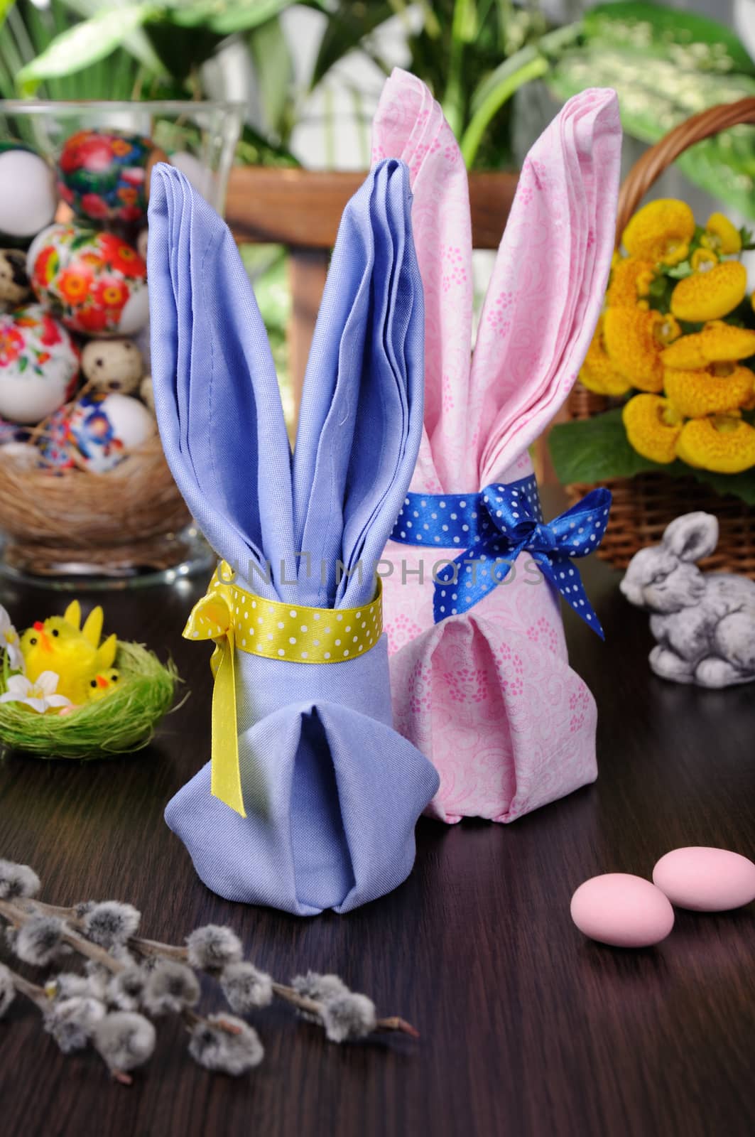 Napkin folded as an Easter bunny on a table