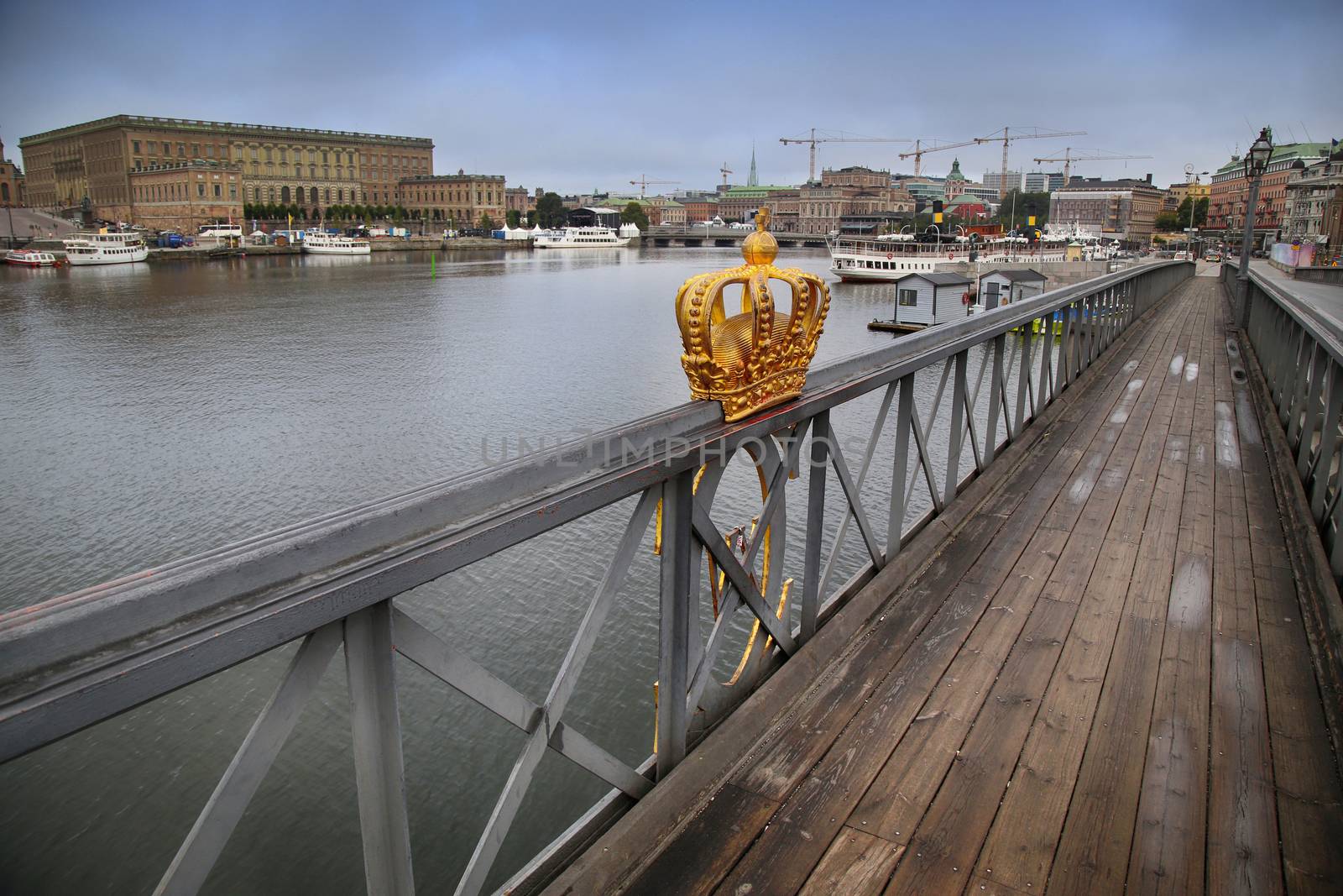 Skeppsholmsbron (Skeppsholm Bridge) with Golden Crown on a bridg by vladacanon
