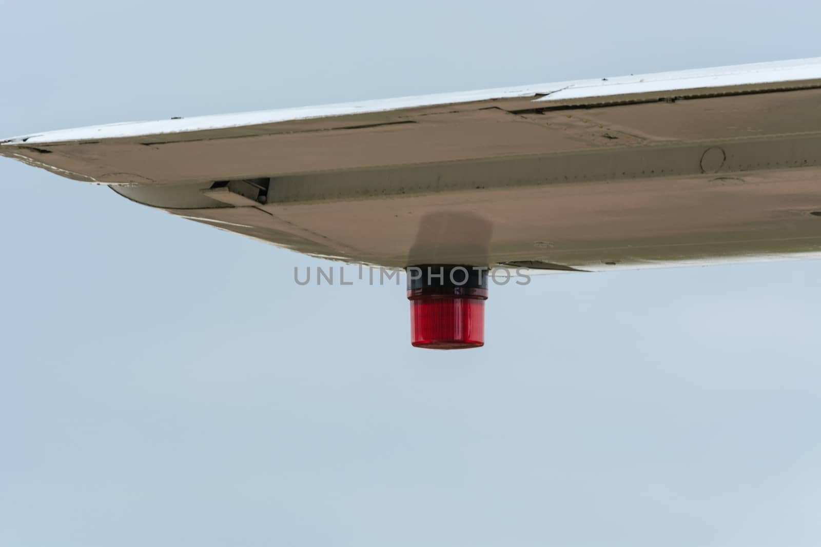 Wing of an airplane with position lighting.