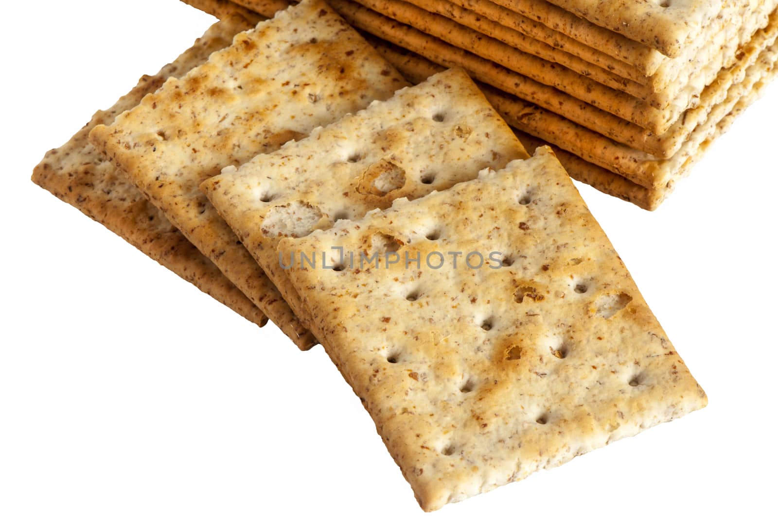 some whole wheat crackers on white background