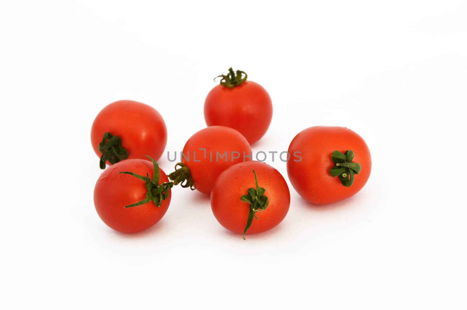 On white & copy space fresh healthy cherry tomatoes stock pictures