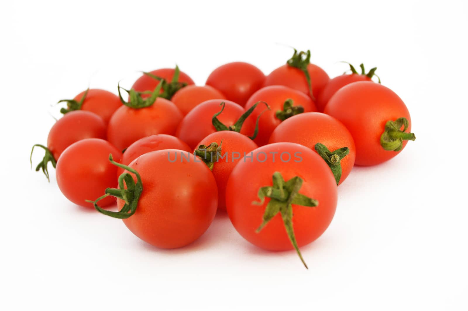 On white & copy space fresh healthy cherry tomatoes stock pictures