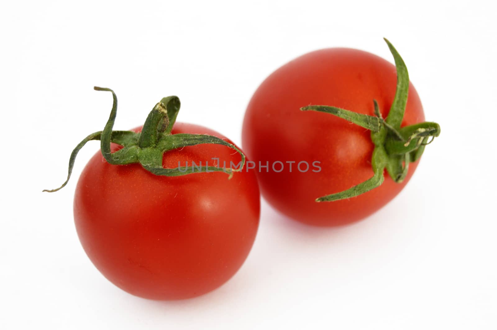 On white & copy space fresh healthy cherry tomatoes stock pictures