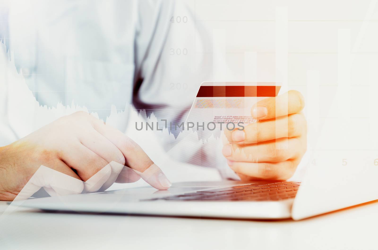 Man using laptop at workplace. credit card pay commerce shopping buy internet laptop concept