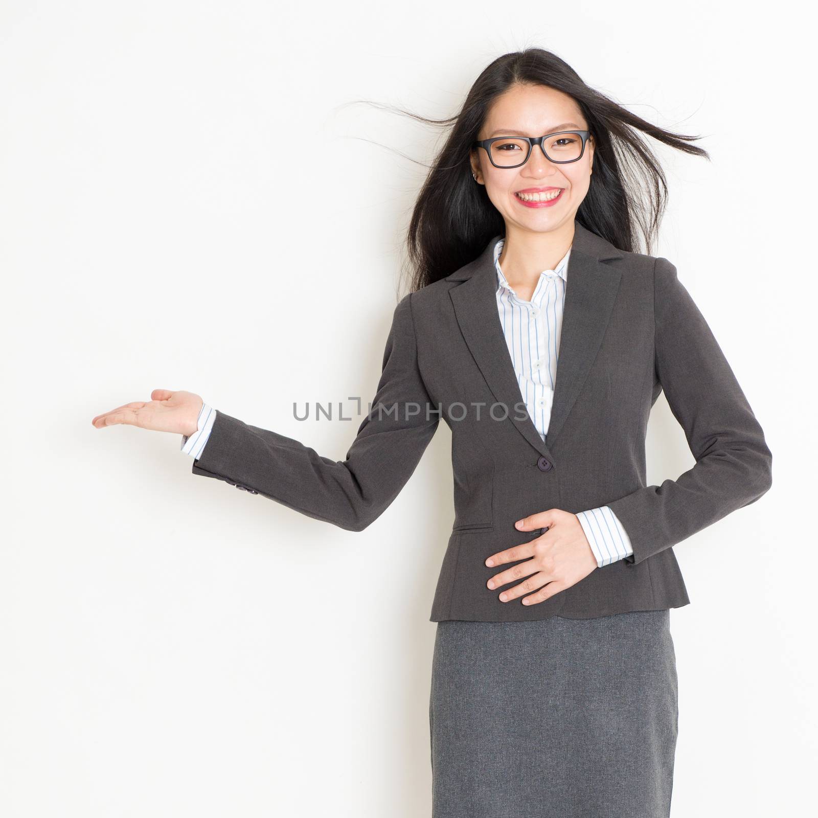 Businesswoman hand showing something by szefei