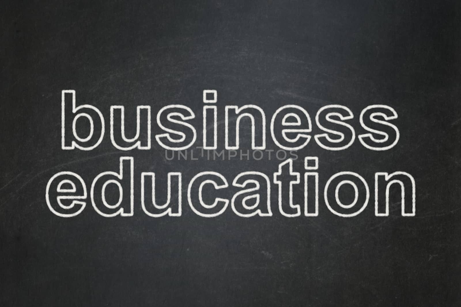 Education concept: Business Education on chalkboard background by maxkabakov