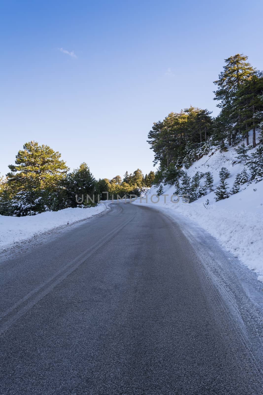 Road in Ziria mountain on a winter day, Korinthia, South Peloponnese, Greece. Ziria is one of the snowiest mountains in Peloponnese (2,374m).