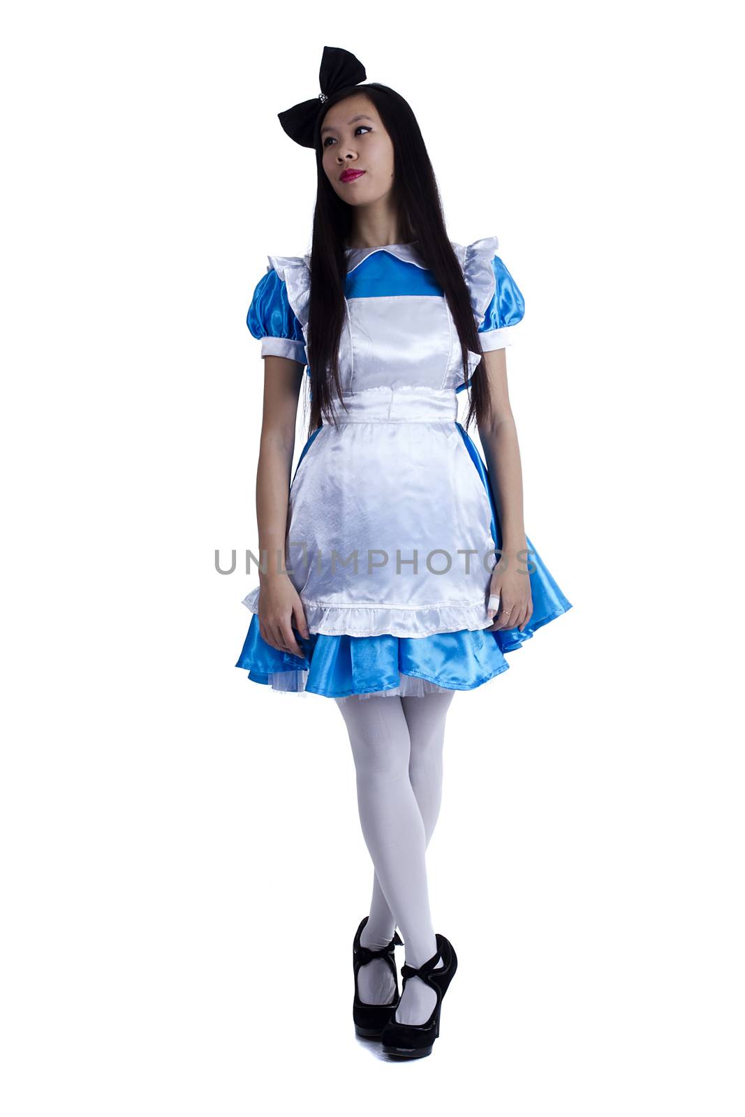 Young girl in the image of Alice on a white background