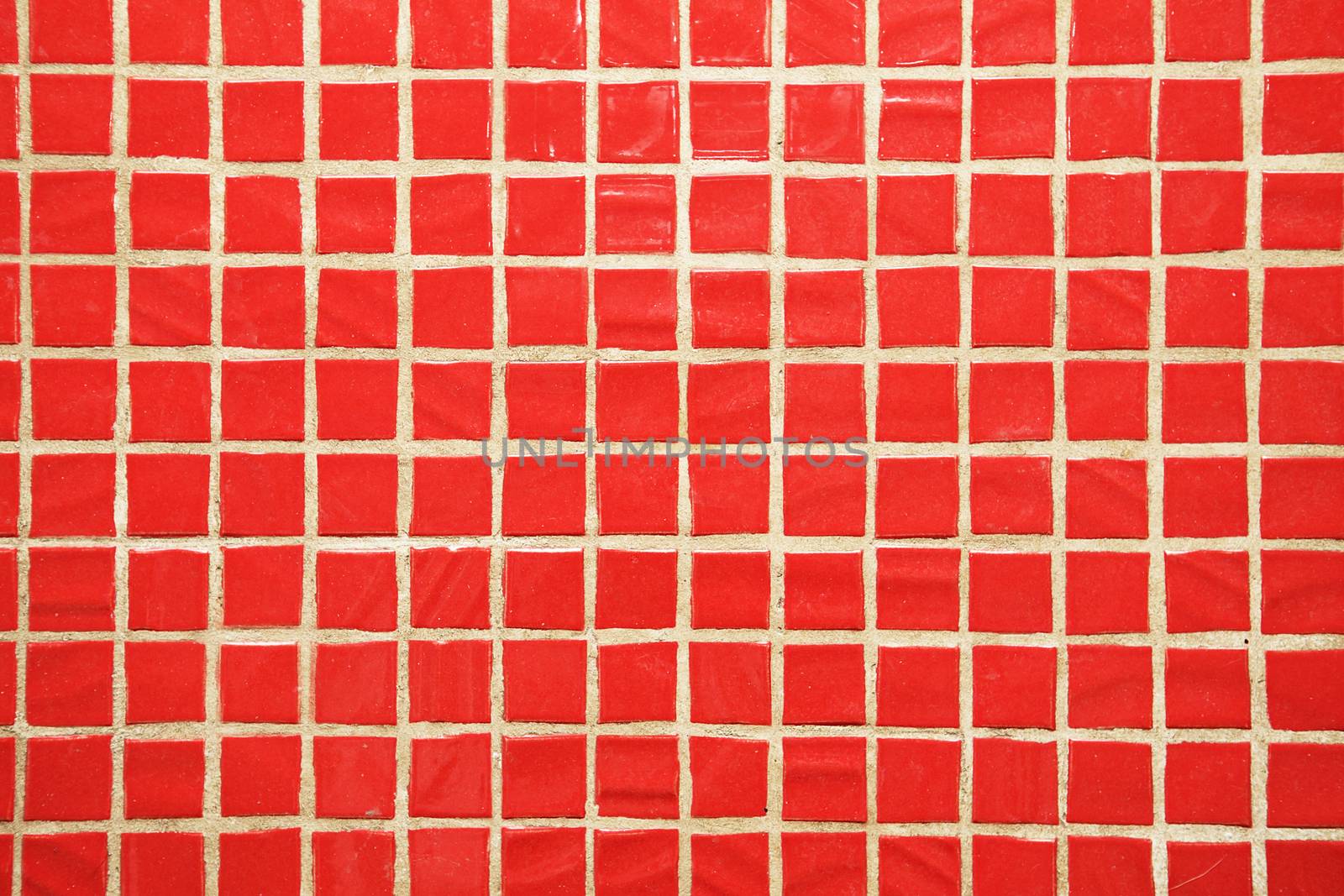 Texture of fine little ceramic tiles background. Red floor tiles