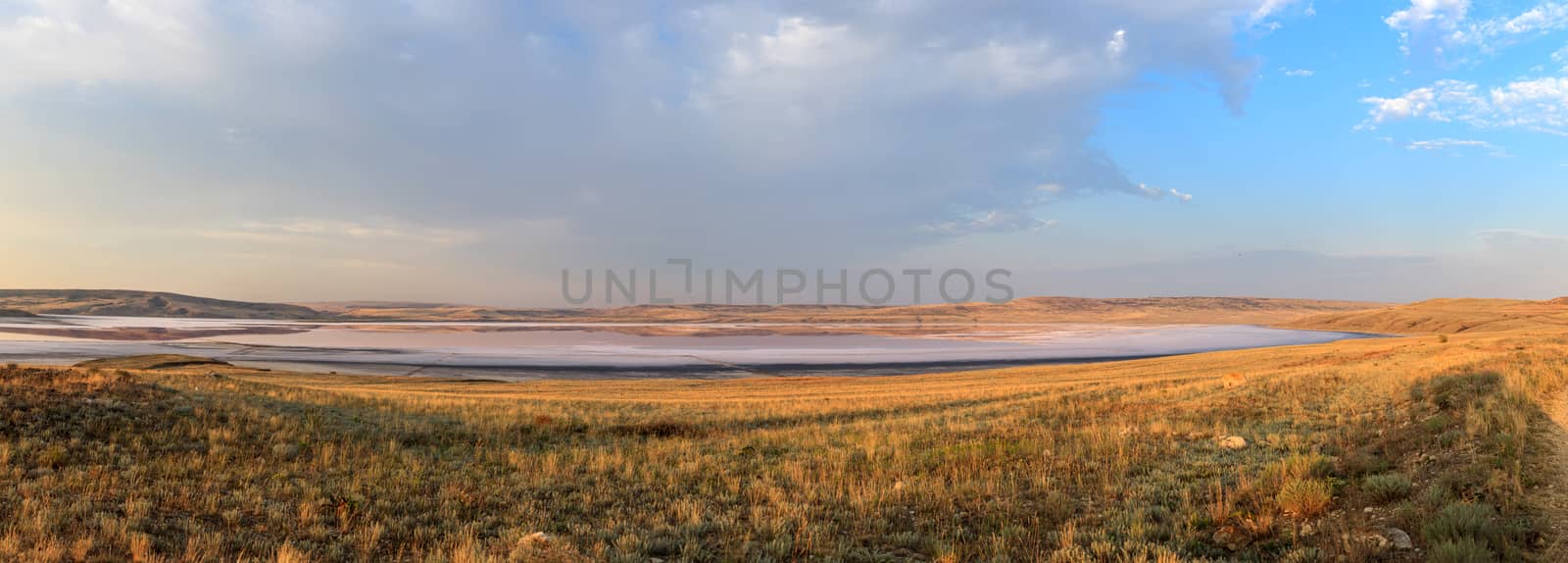 autumn landscape, salt lake on a background of hills and sky