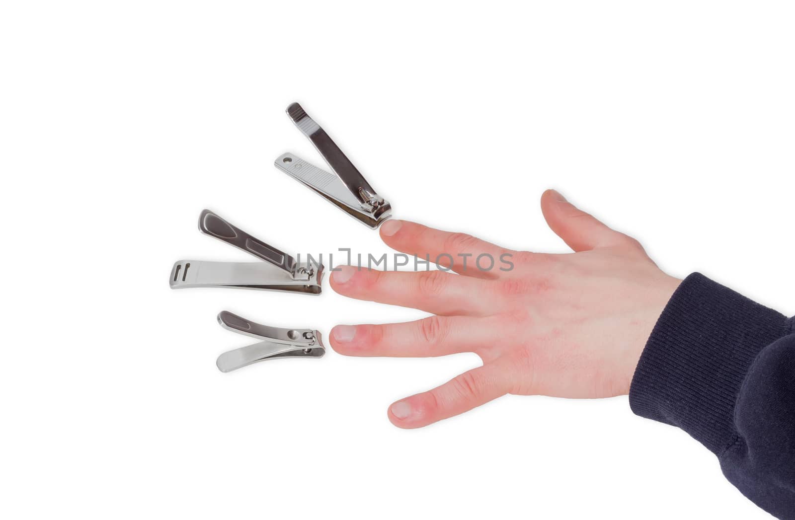 Three nail clippers opposite the fingers of a male hand by anmbph