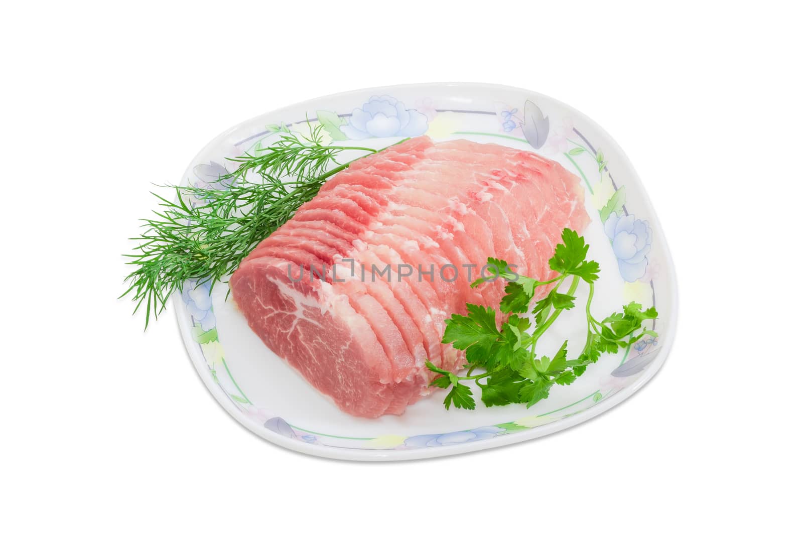 Sliced uncooked pork tenderloin and sprigs of parsley and dill by anmbph