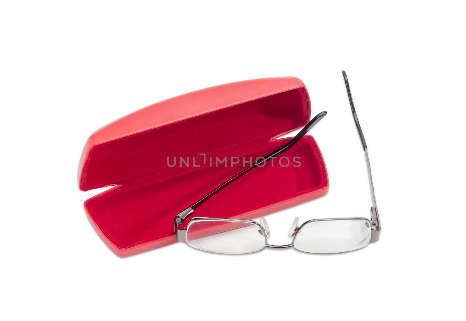 Modern pair of women's eyeglasses with single vision lenses and metal frame and open red spectacle case on a light background
