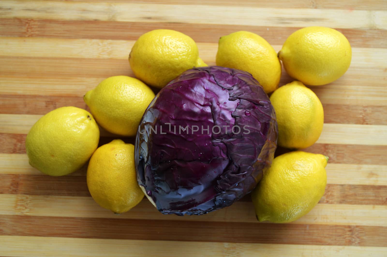 Black, cabbage and lemon paintings on a white background