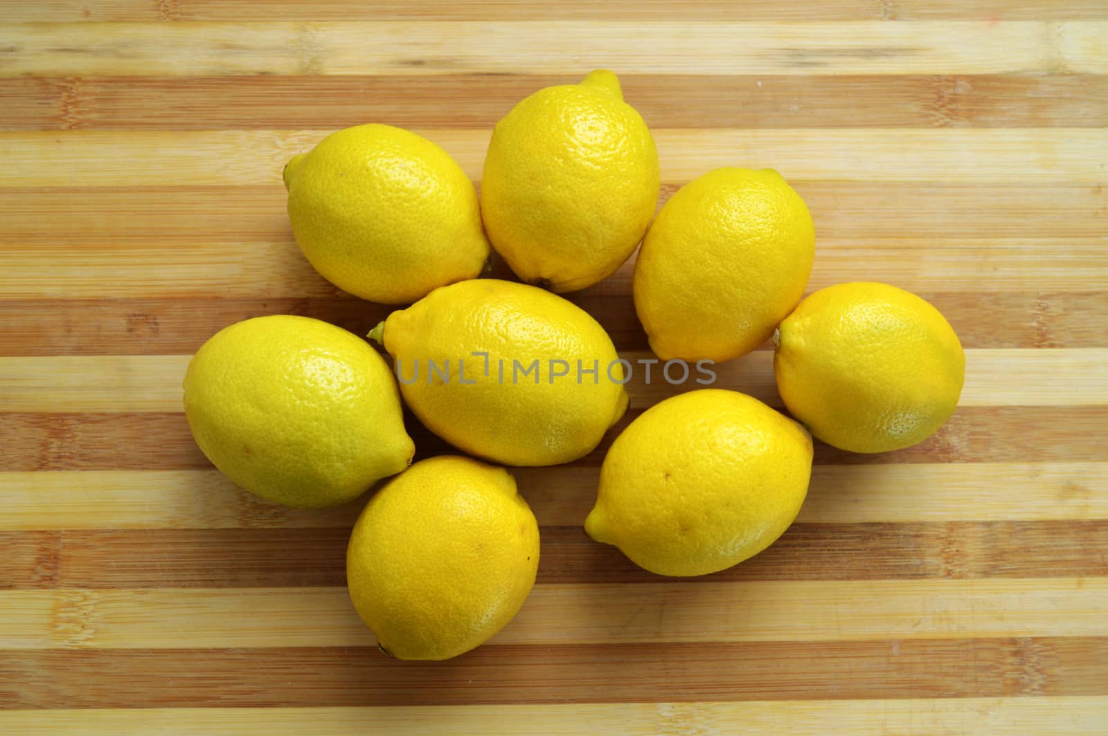 Lemon paintings on the finest wooden chopping board