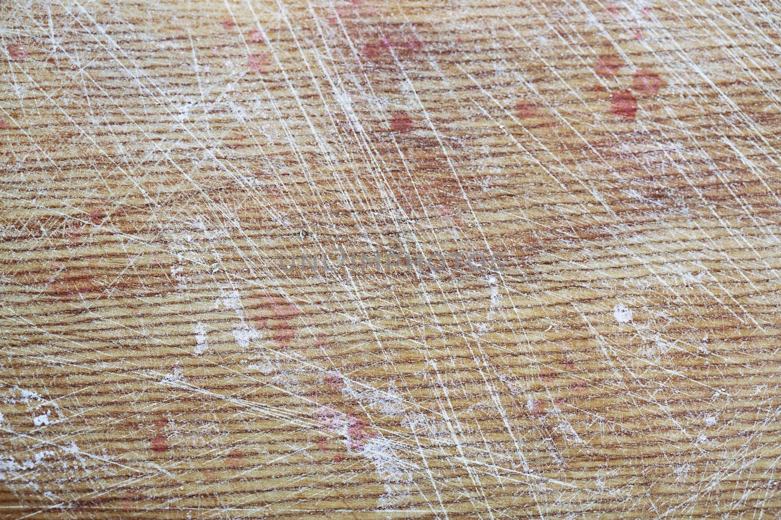 Texture of the scratched wood with blood stains