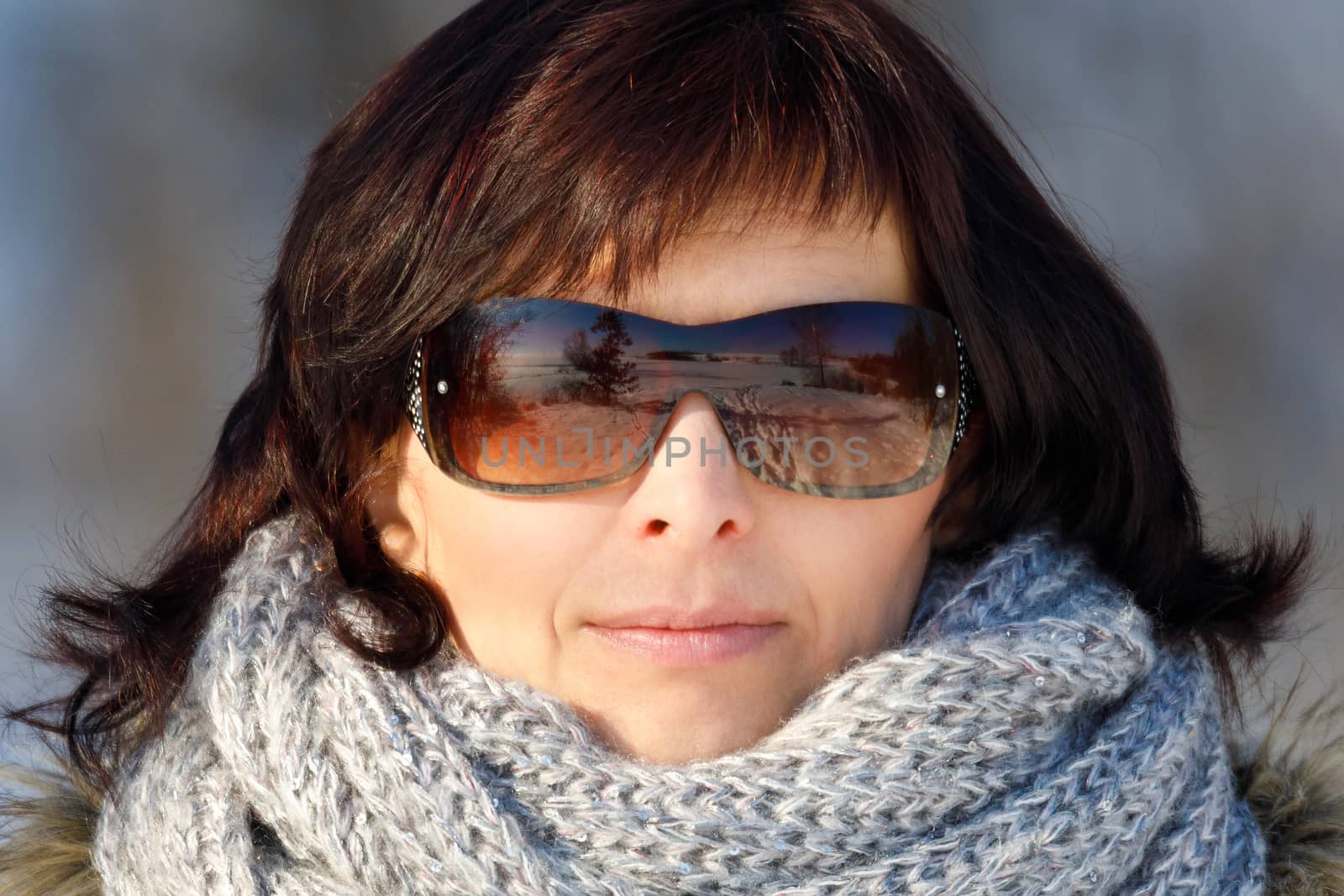 woman with sunglasses without makeup in winter time by artush