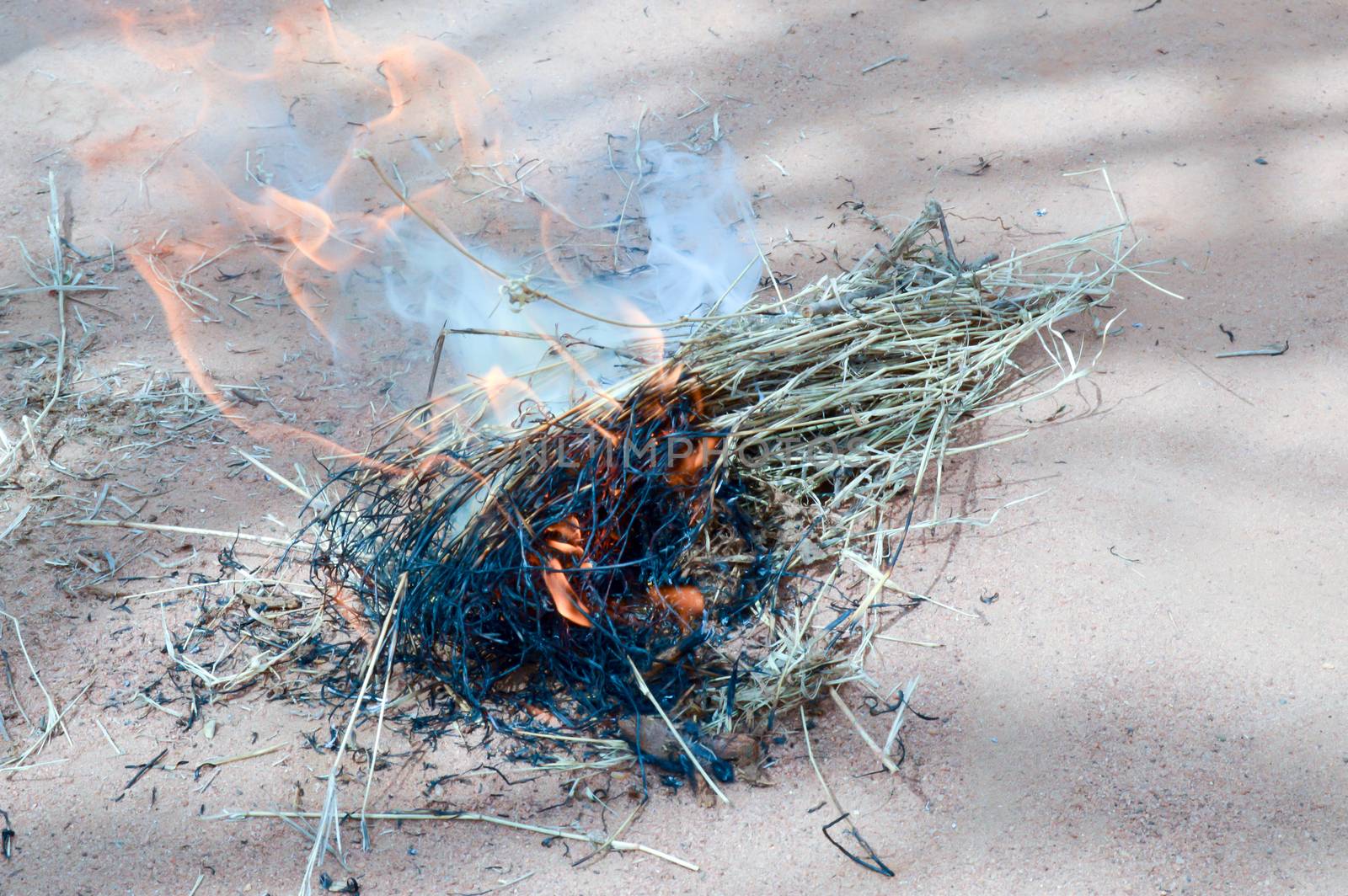 Fire of twigs in a village of Maasai in Kenya