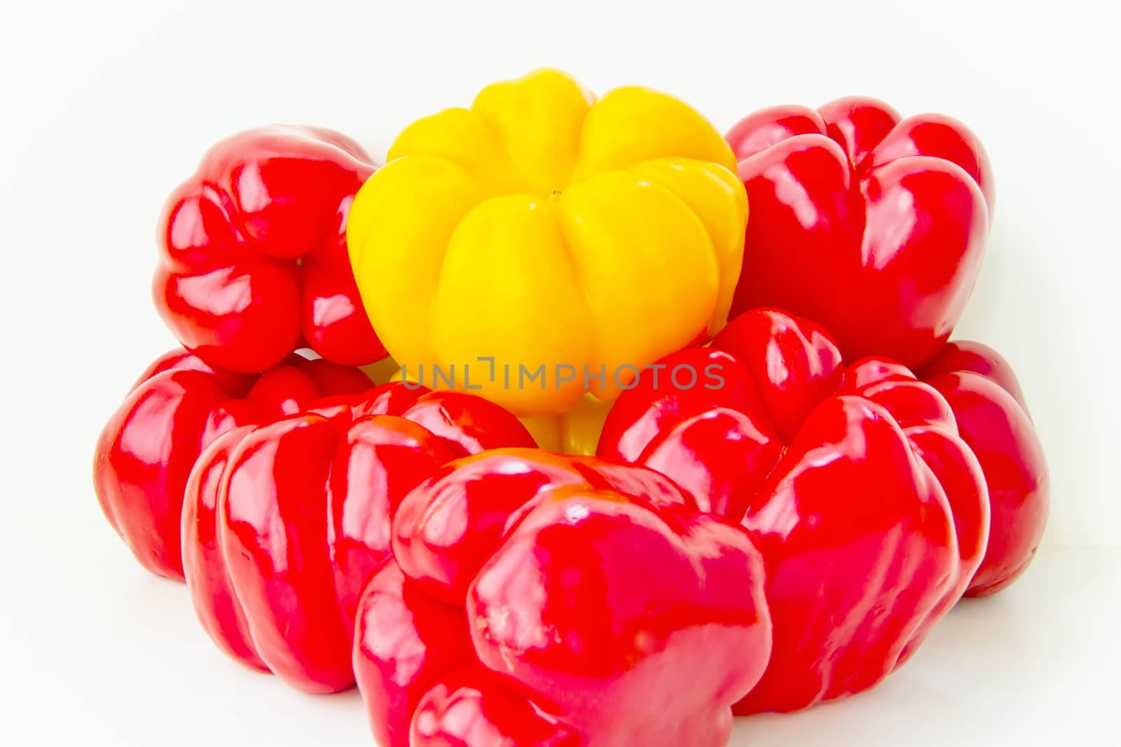 Photo of fresh red and yellow raw pepper on white background