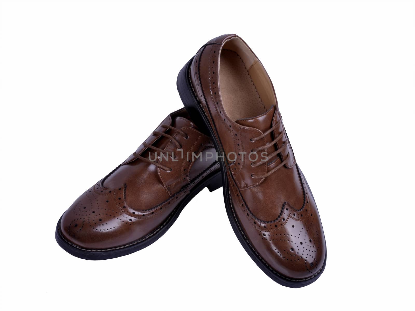 Men's classic brown leather shoes isolated on white background by Nikola30