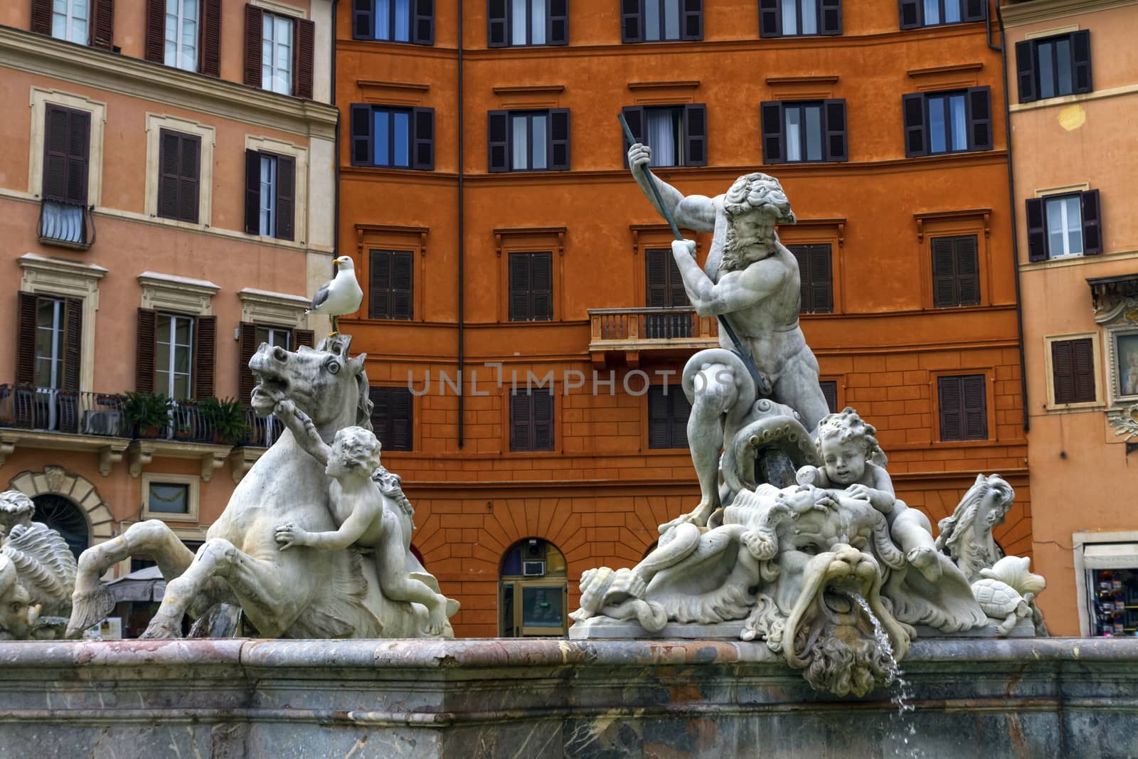 Fontana del Nettuno, fountain of Neptune, in colorful Piazza Navona, Roma, Italy