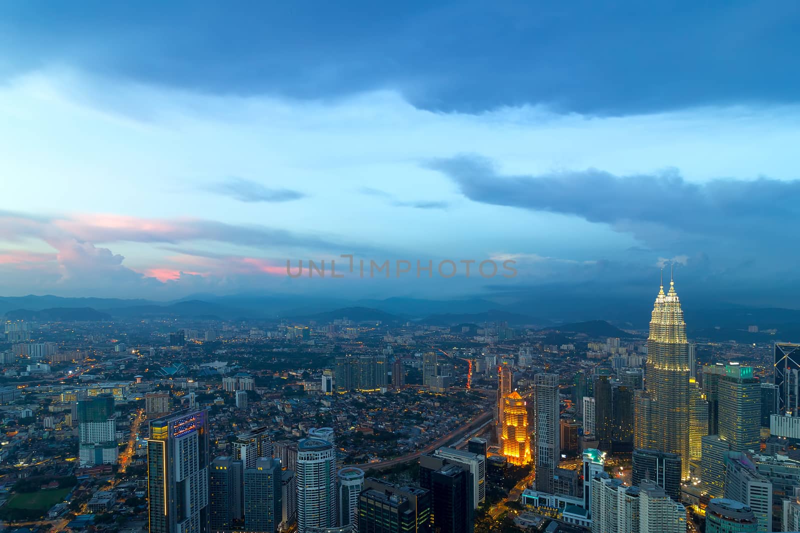 Kuala Lumpur cityscape during evening twilight blue hour aerial view