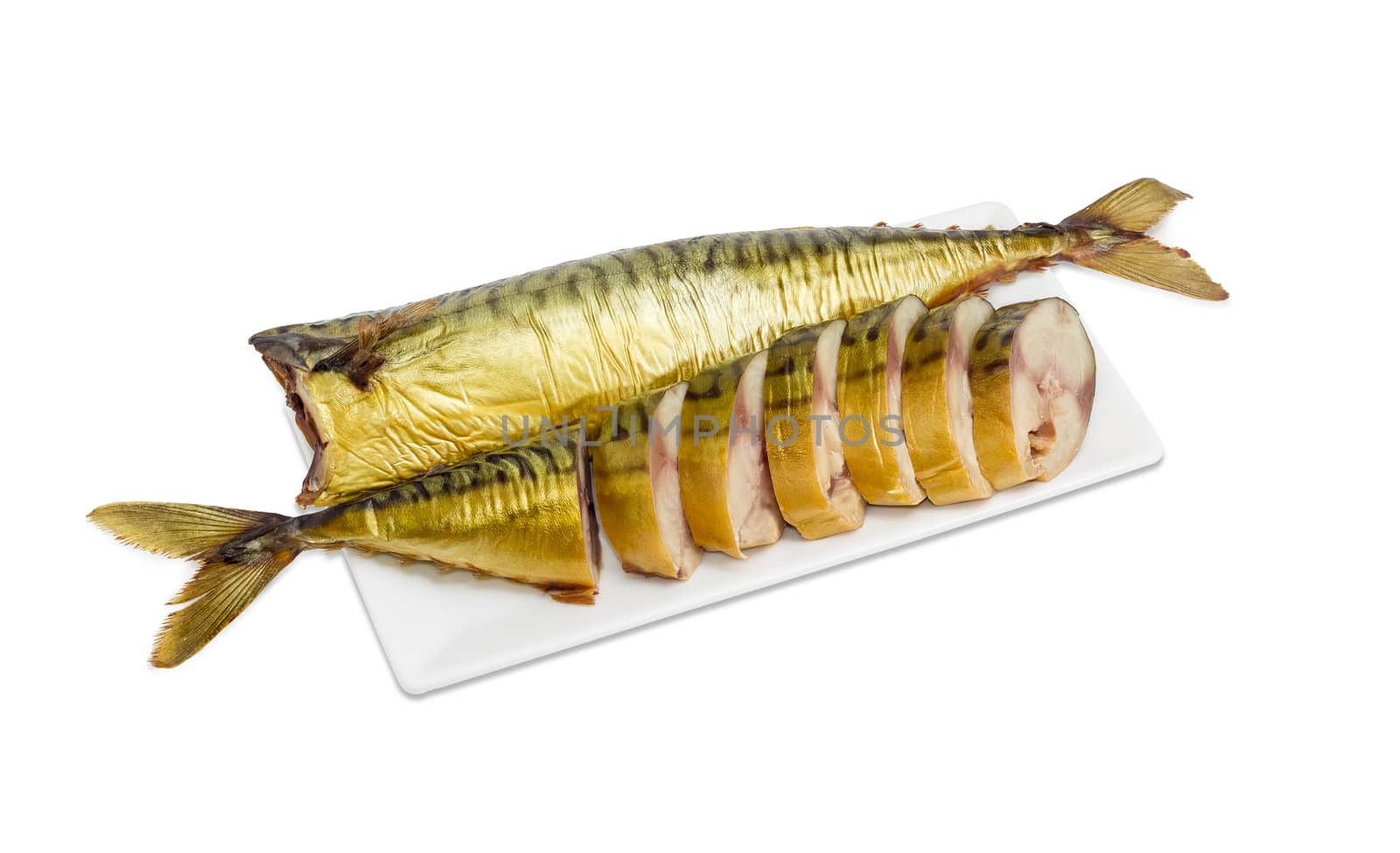 One sliced and one whole smoked Atlantic mackerel on dish by anmbph
