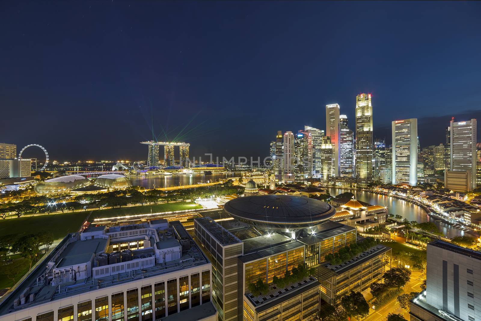 Singapore Cityscape with view of Supreme Court Marina Bay and Central Business District skyscrapers at night