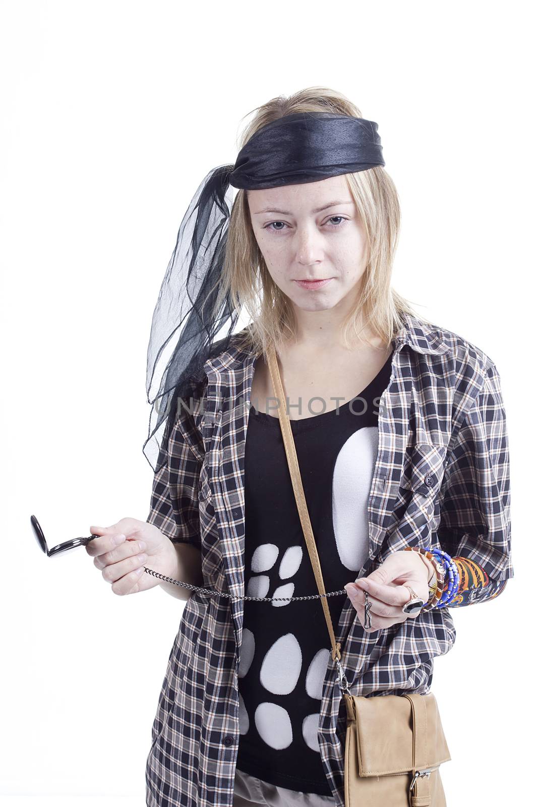 Young woman in the image of a pirate on a white background