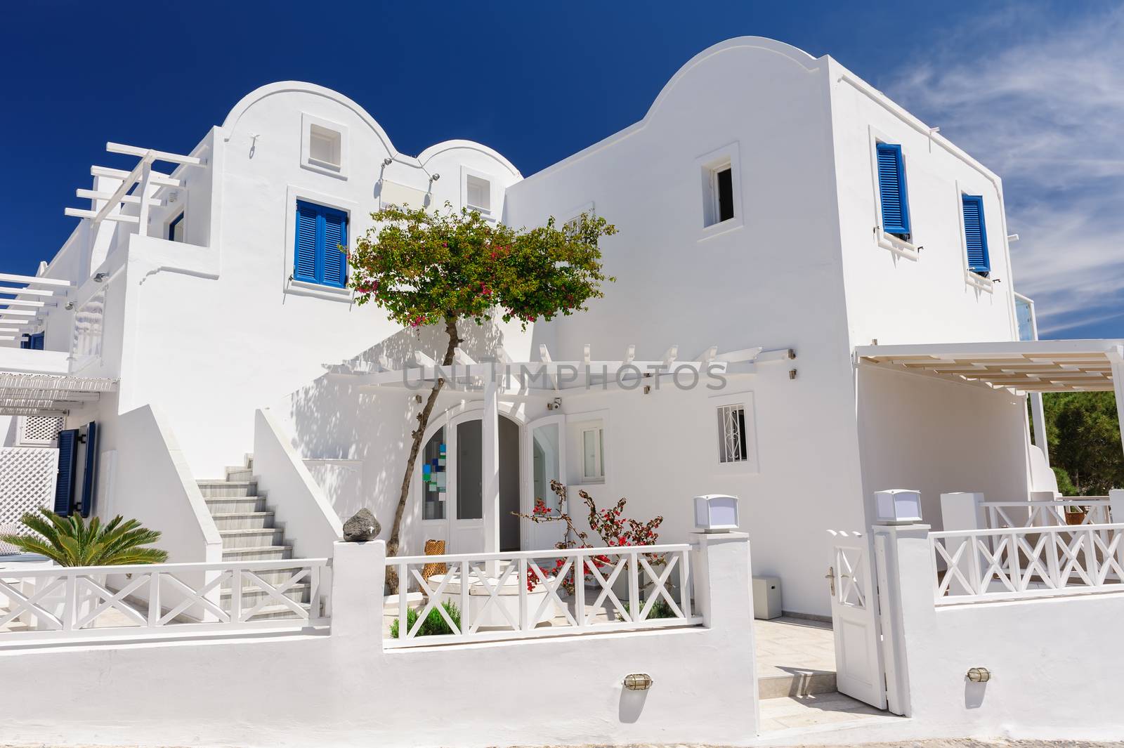 View to most typical kind of luxury pension building in Oia, Santorini, Greece