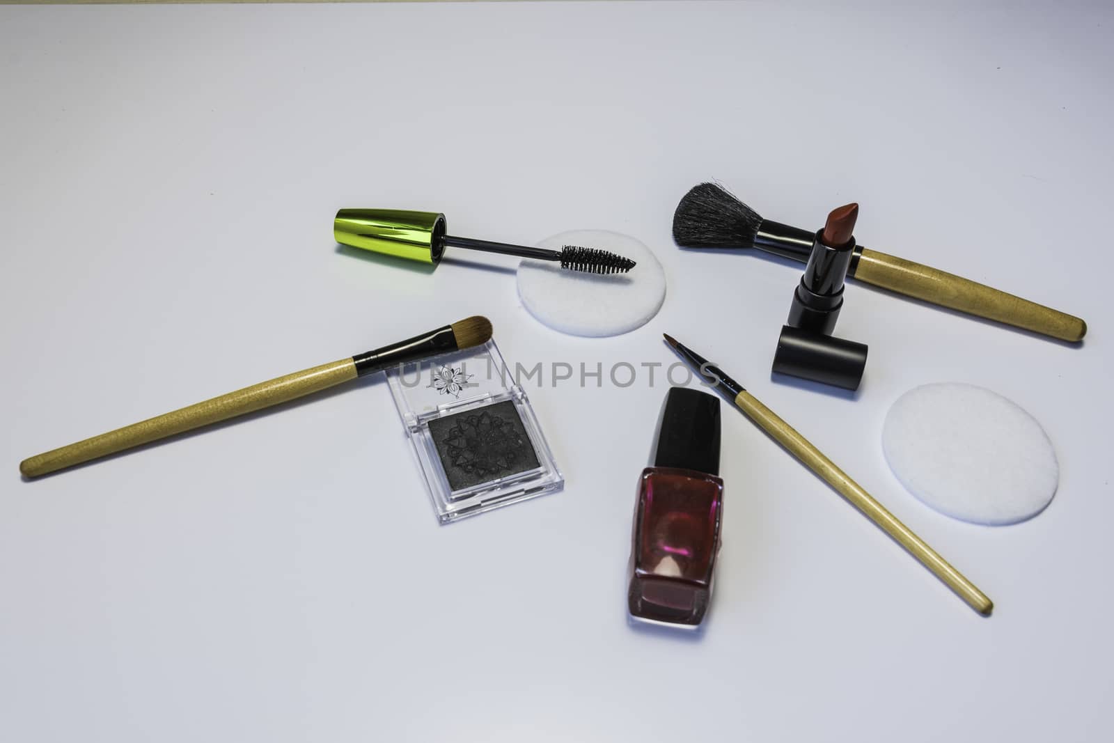 Cosmetic Tools and products on a white background