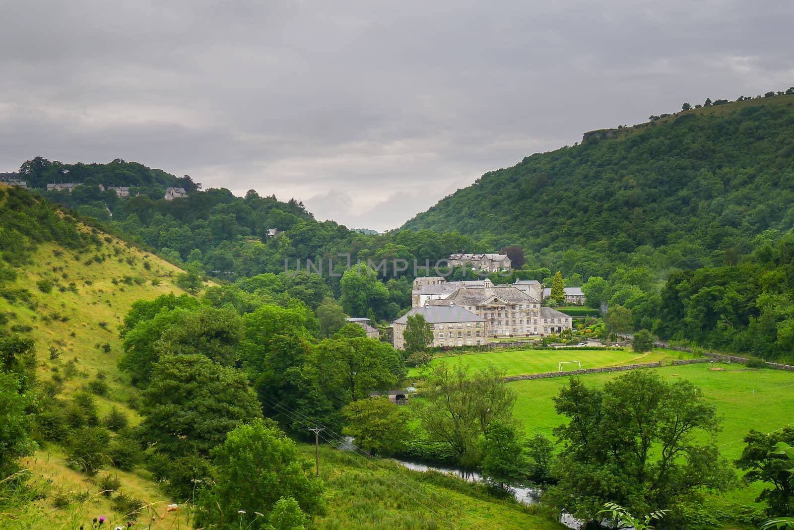 Cressbrook Mill as viewed from the Monsal Trail by chrisukphoto