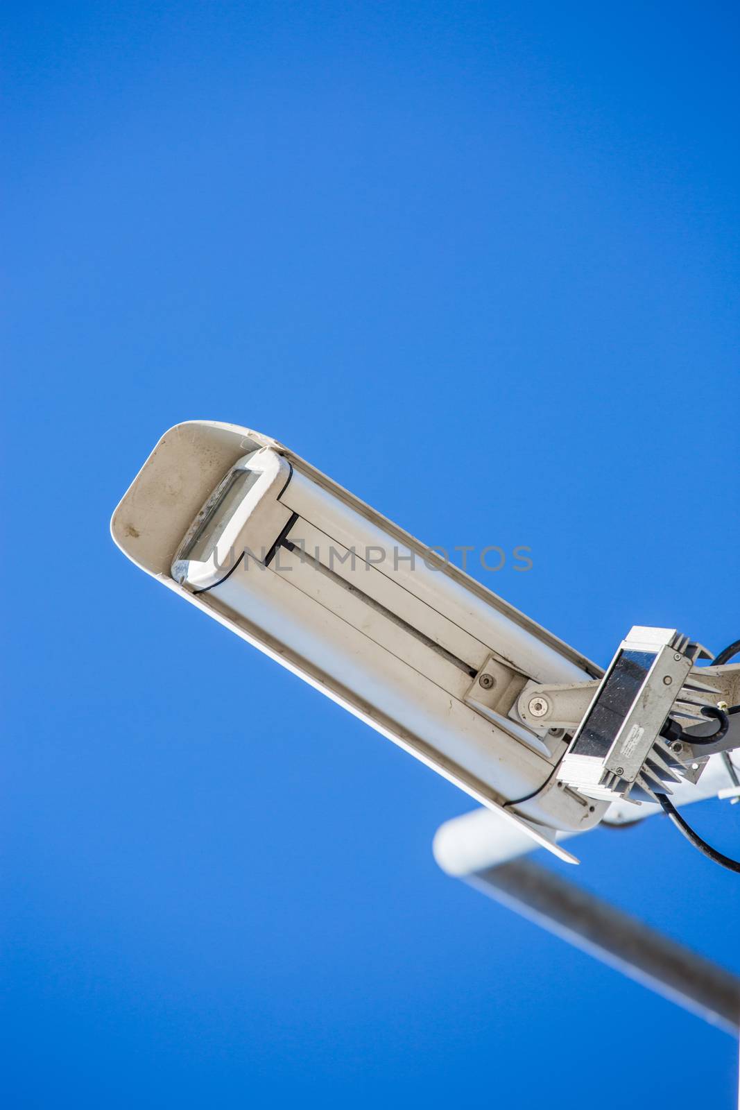 close up image of CCTV security camera fixed on a pole metalic