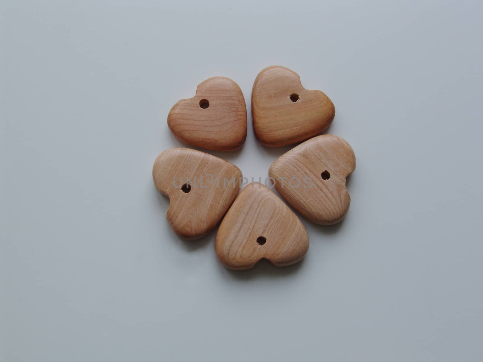 Handicraft goods,  wooden beads, a heart